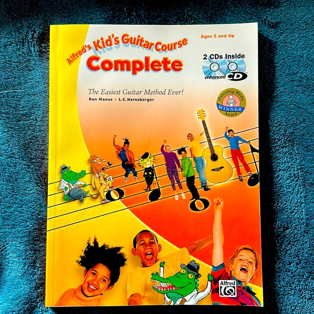 Alfred’s Kid’s guitar course complete. Easiest guitar method ever! CD included